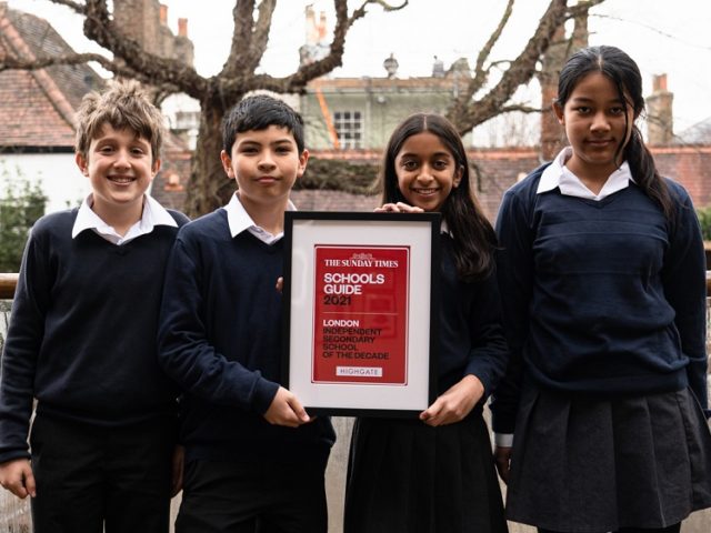 Highgate Pupils holding an award